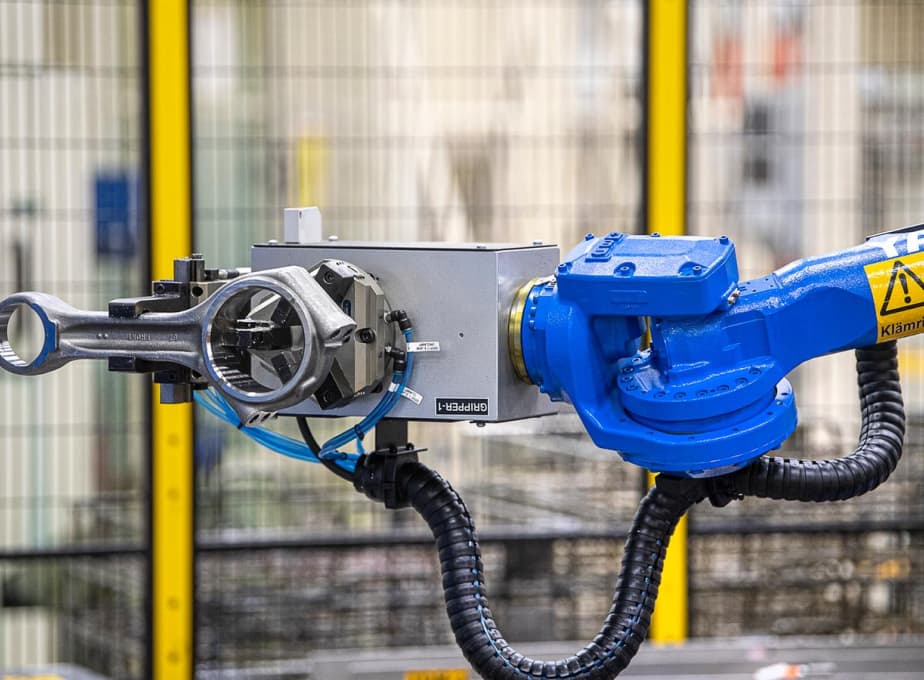 En robotarm i Sanseras fabrik